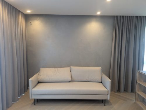 Minimalistinė pilka sienų tekstūra interjere